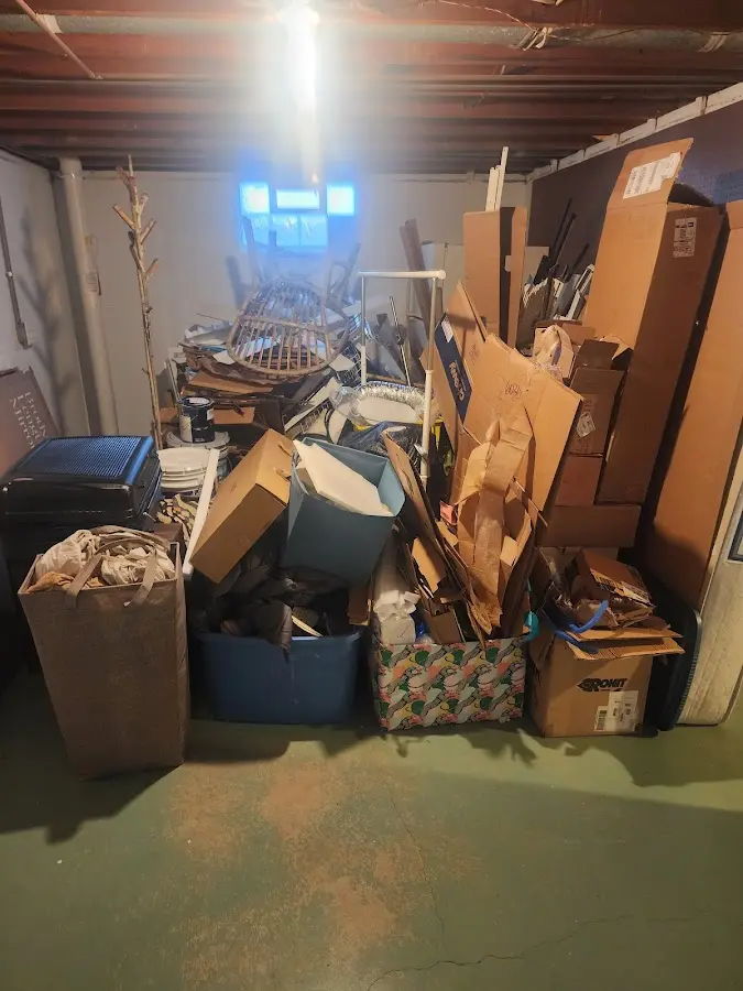 Roll-off dumpster container at job site for 4 Yard Dumpster Rental in Chickasaw